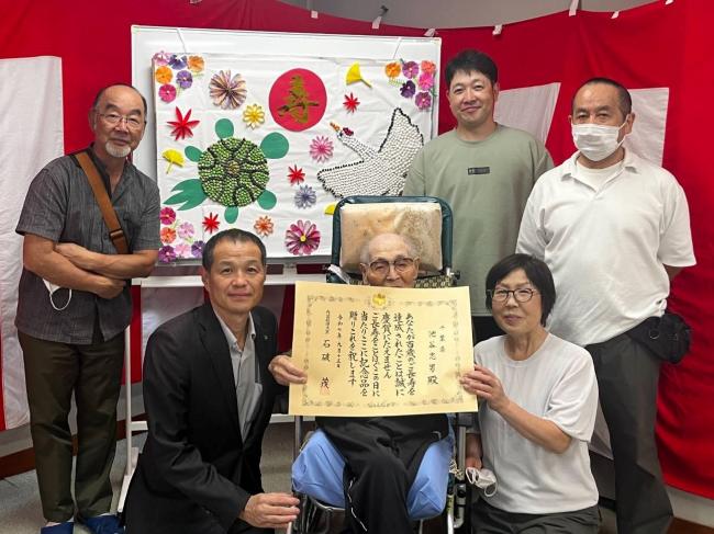 市長と、池谷忠男さんと、御家族で